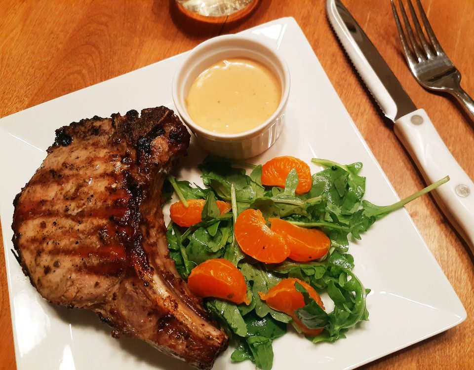 deviled pork chop with salad