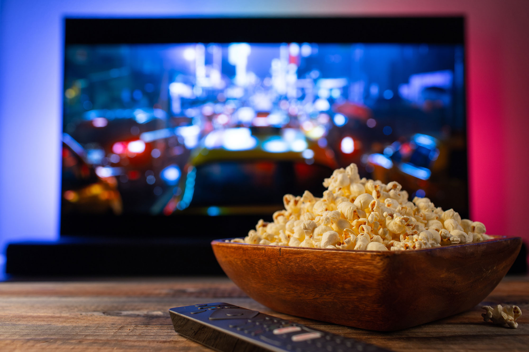 butter popcorn in front of tv screen