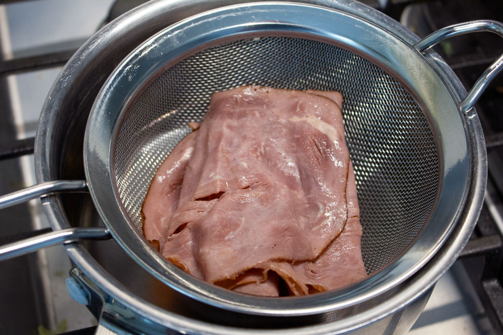 heating roast beef over boiling water